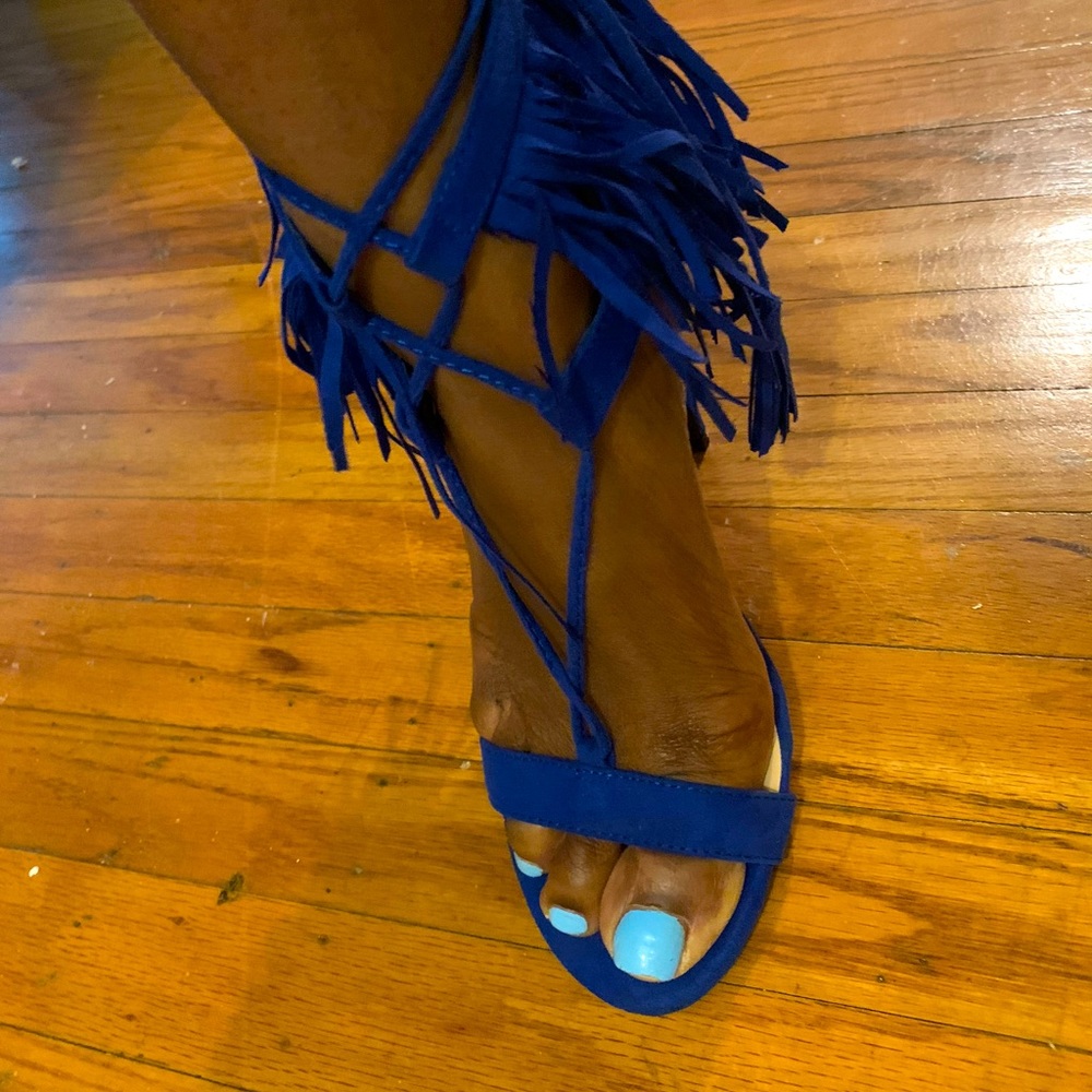 Gently used sandal with a heel